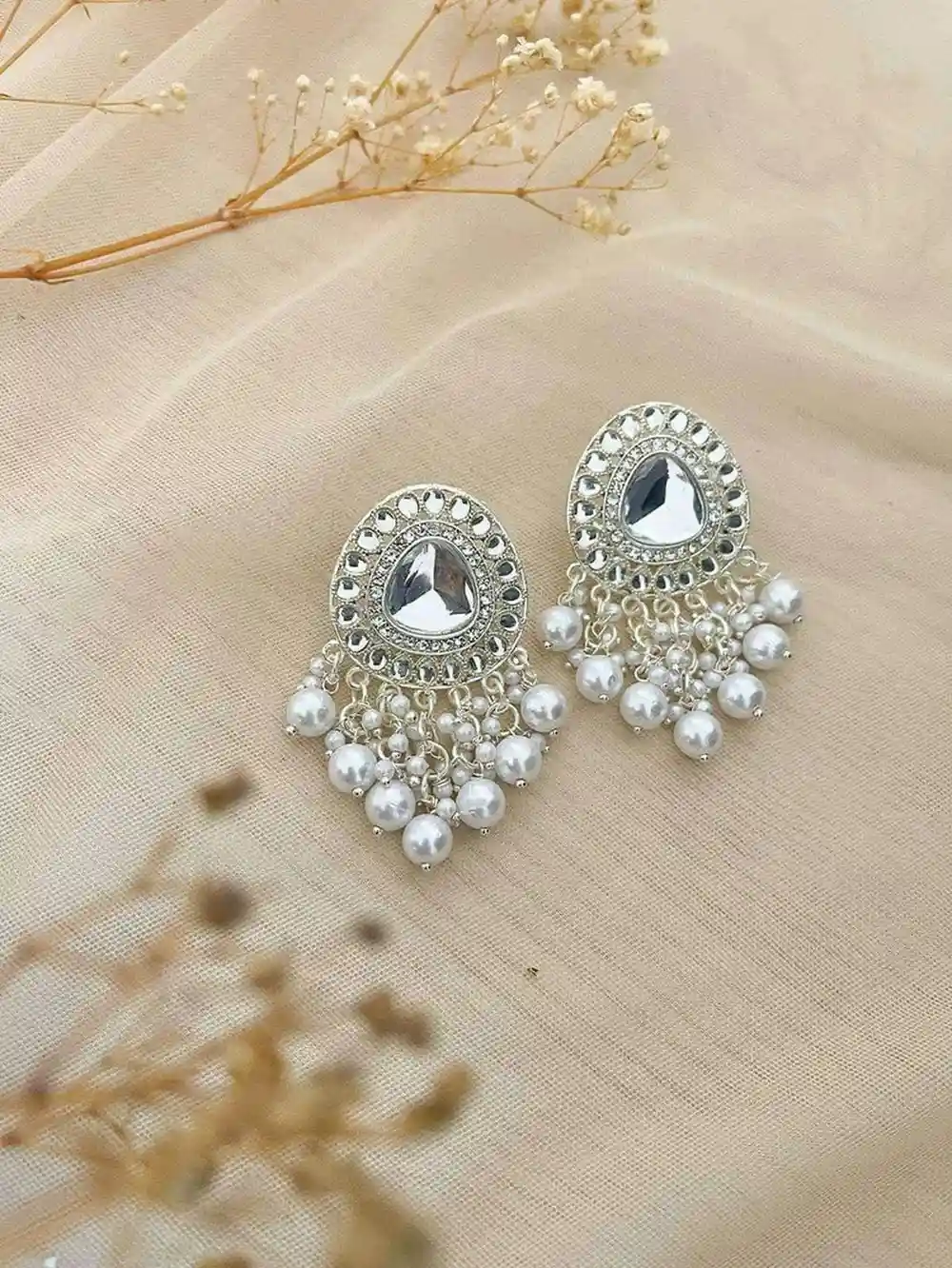 Jhumka earrings with diamonds and ghunghroo details